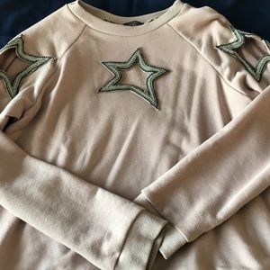 Pink sweater with diamond star imprints